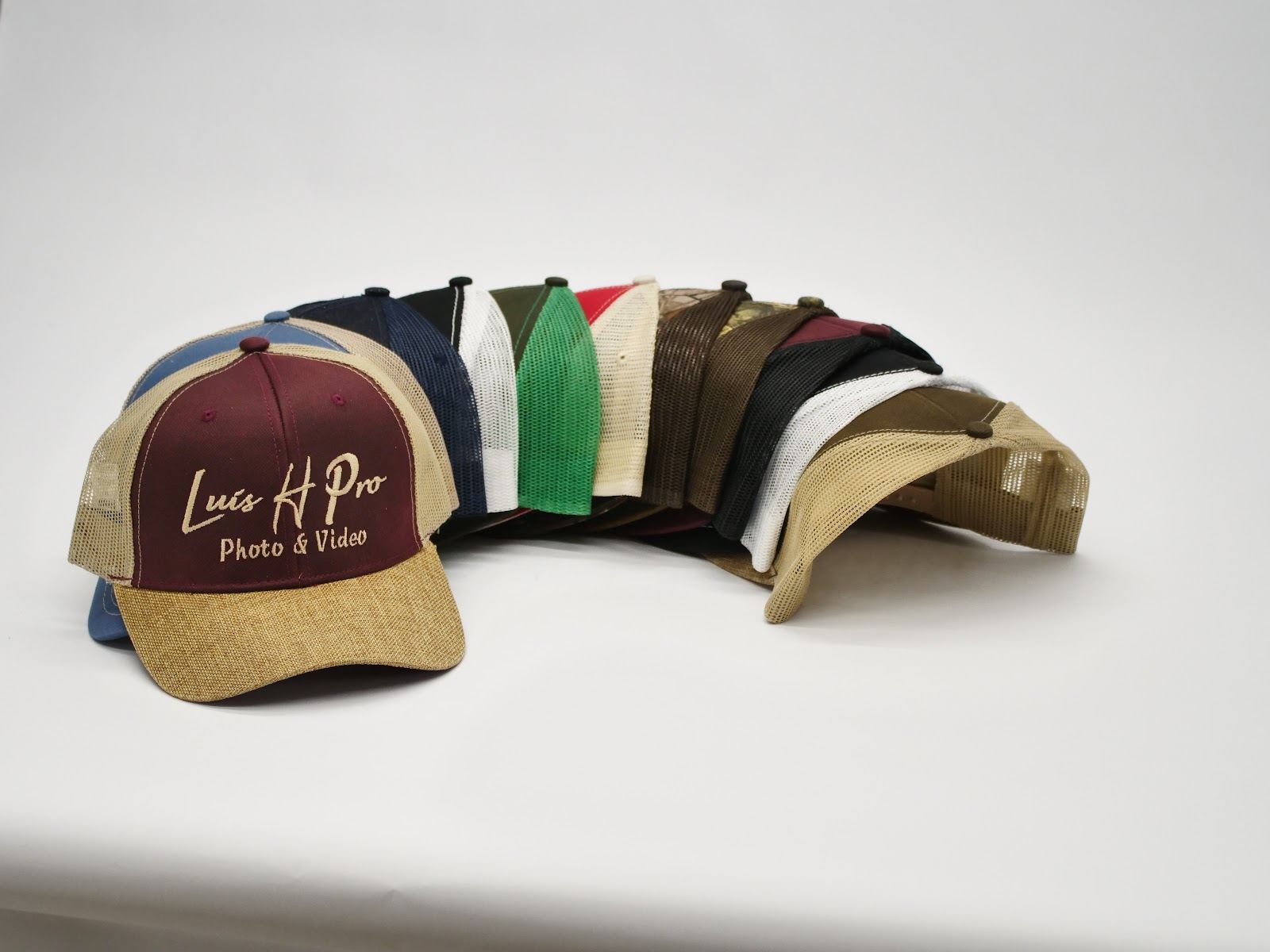Row of Luis H Pro Photo & Video branded caps